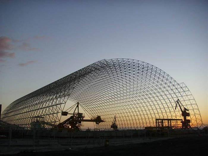 Cylindrical space frame shell over a stockpile