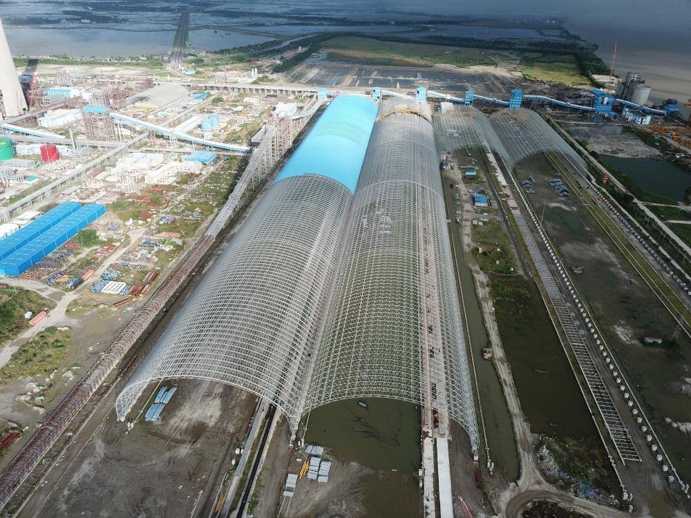 Cylindrical shell space frame over a coal yard